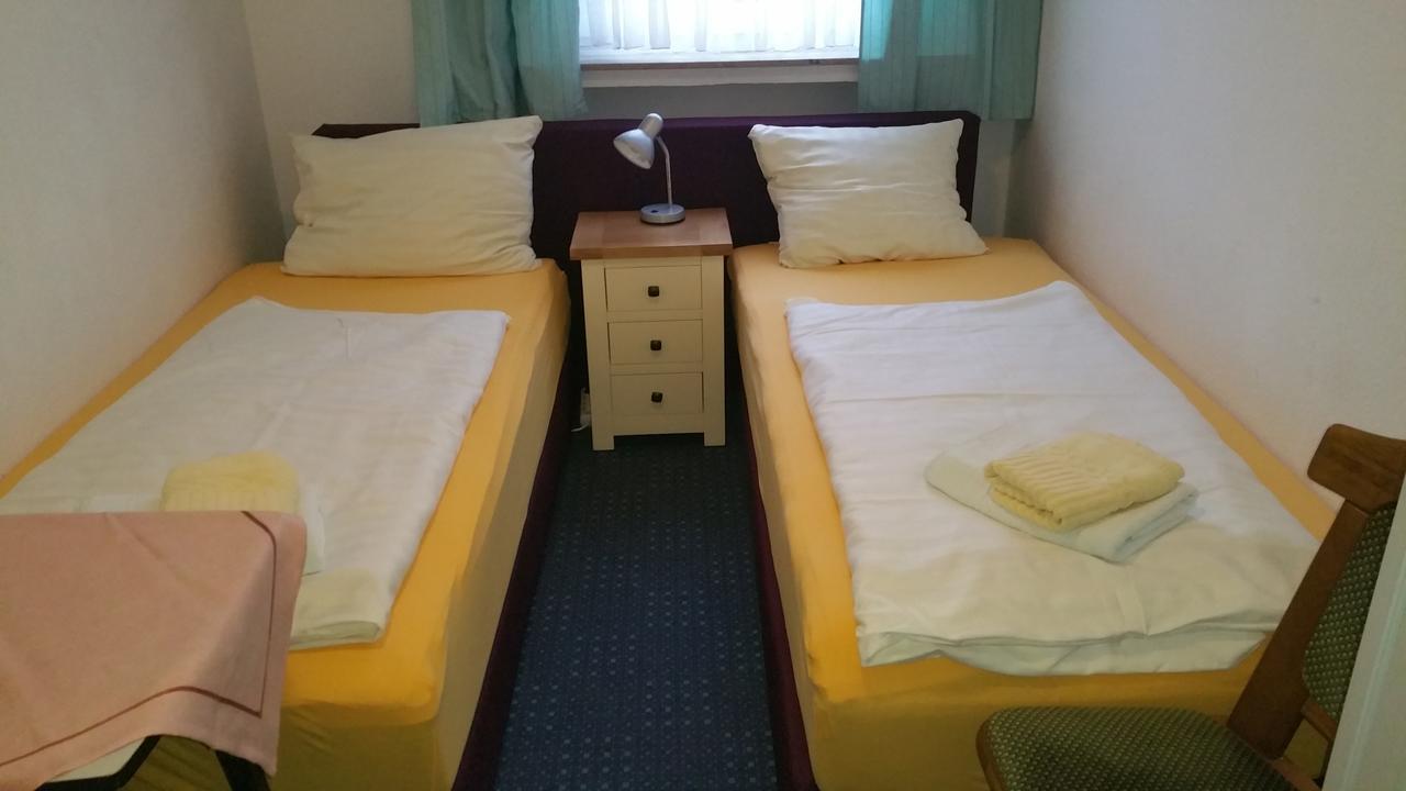 Tweepersoonskamer met 2 Aparte Bedden